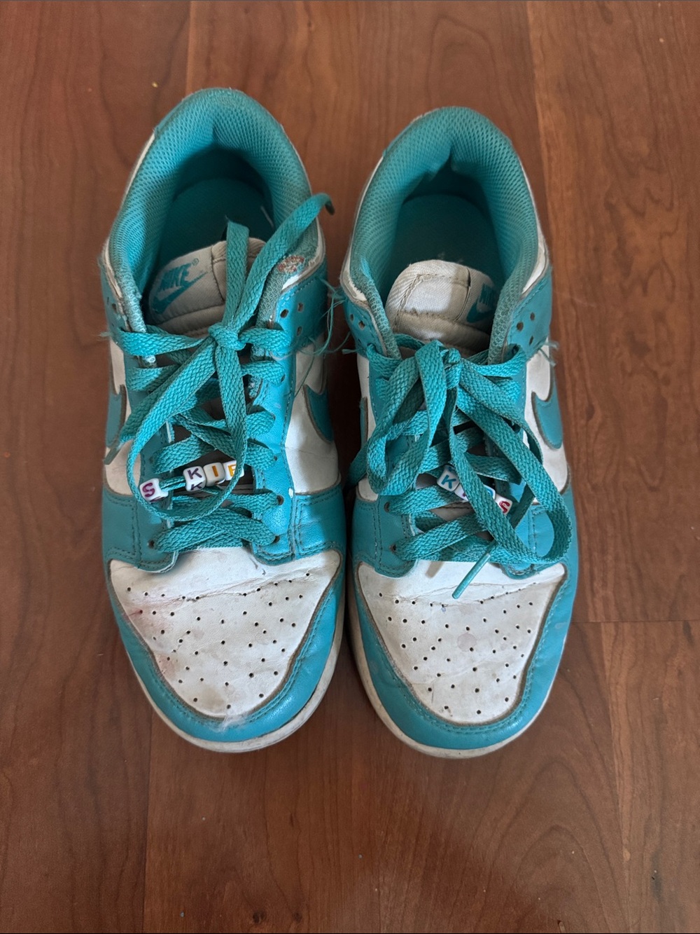 Teal and White Nikes size 7 Women’s